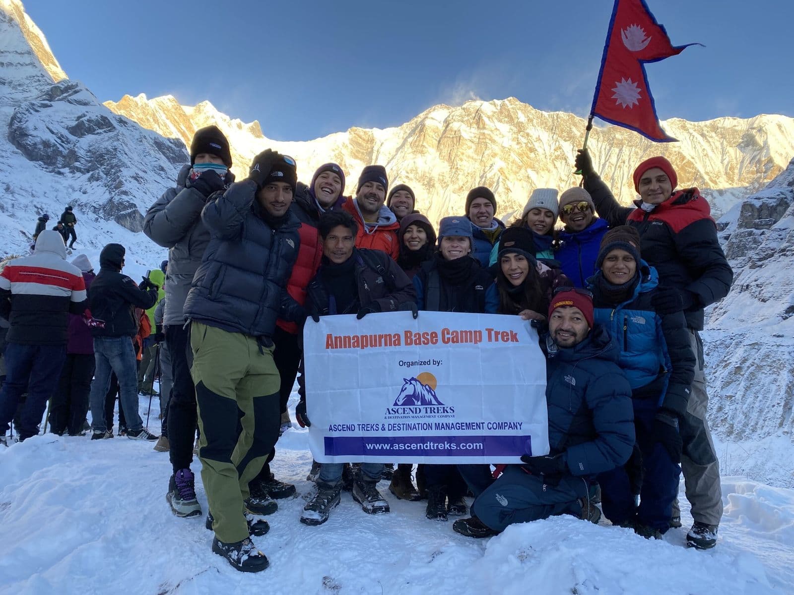 Group with banner at Annapurna Base Camp