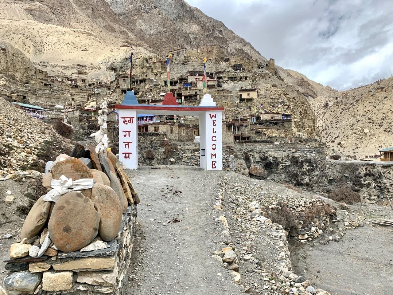Stone gate into a Himalayan village on the Nar Phu trail