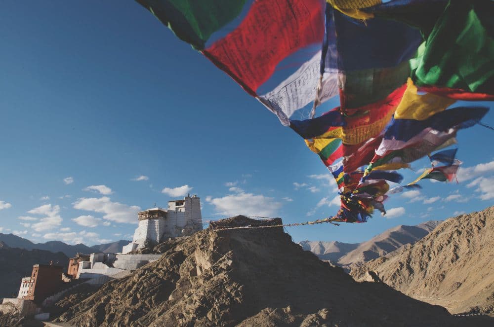 Prayer flags above a hilltop gompa in Upper Mustang