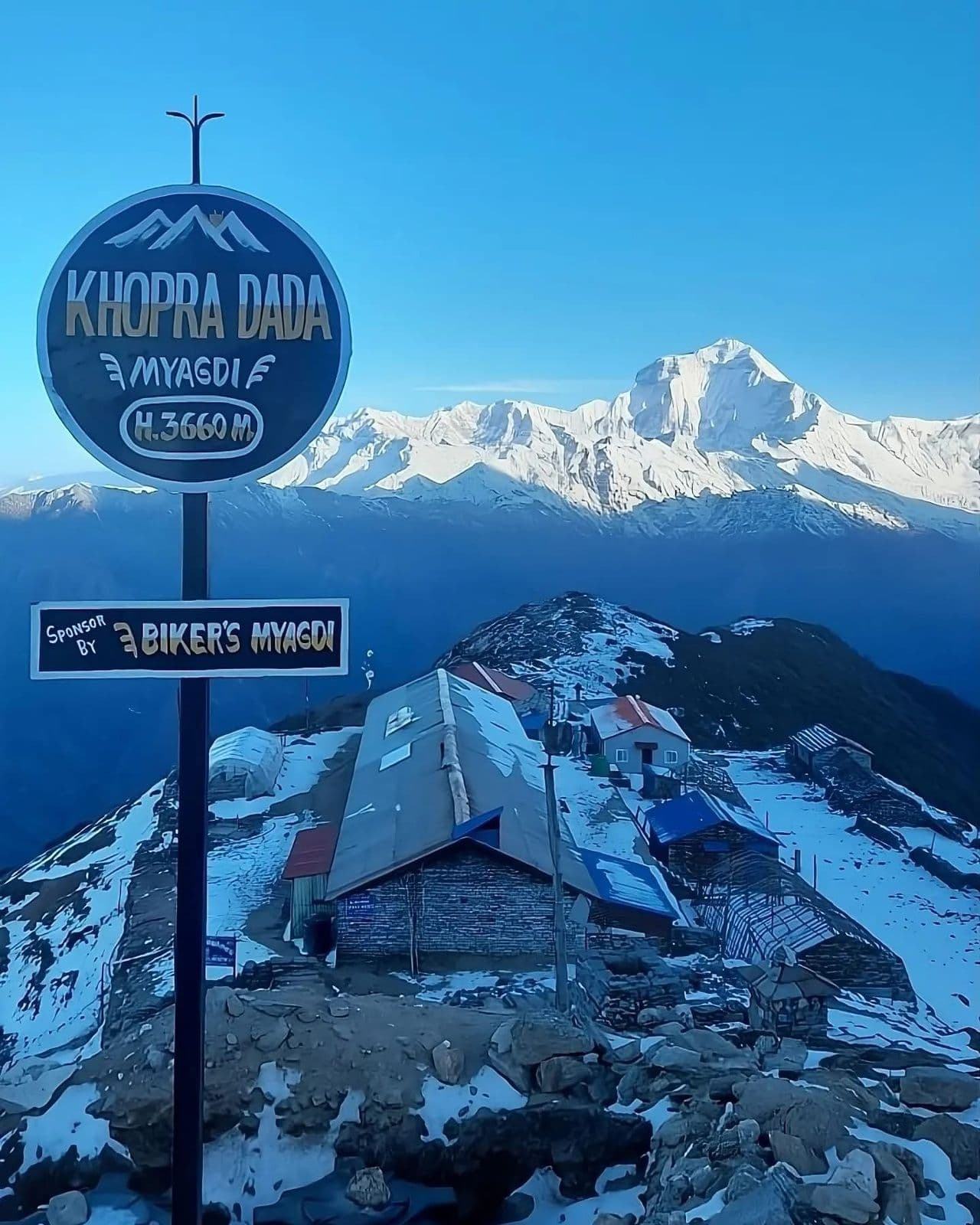 Khopra Danda sign with Dhaulagiri behind