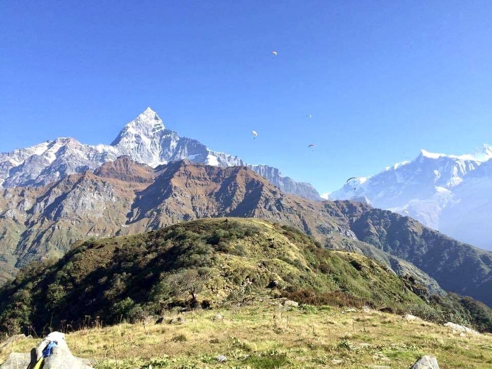 Machhapuchhre above green foothills