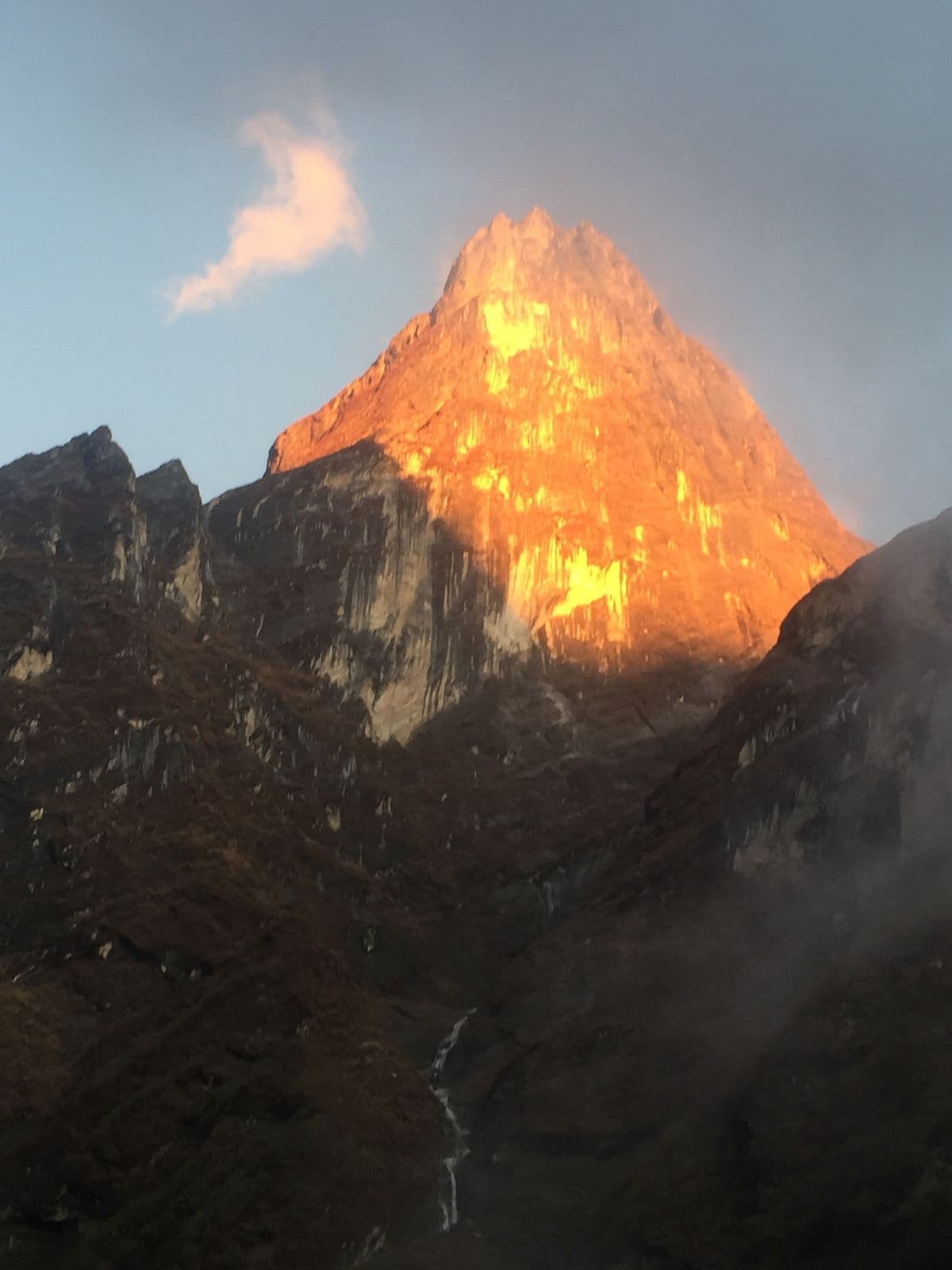 Alpenglow on a jagged peak at sunset